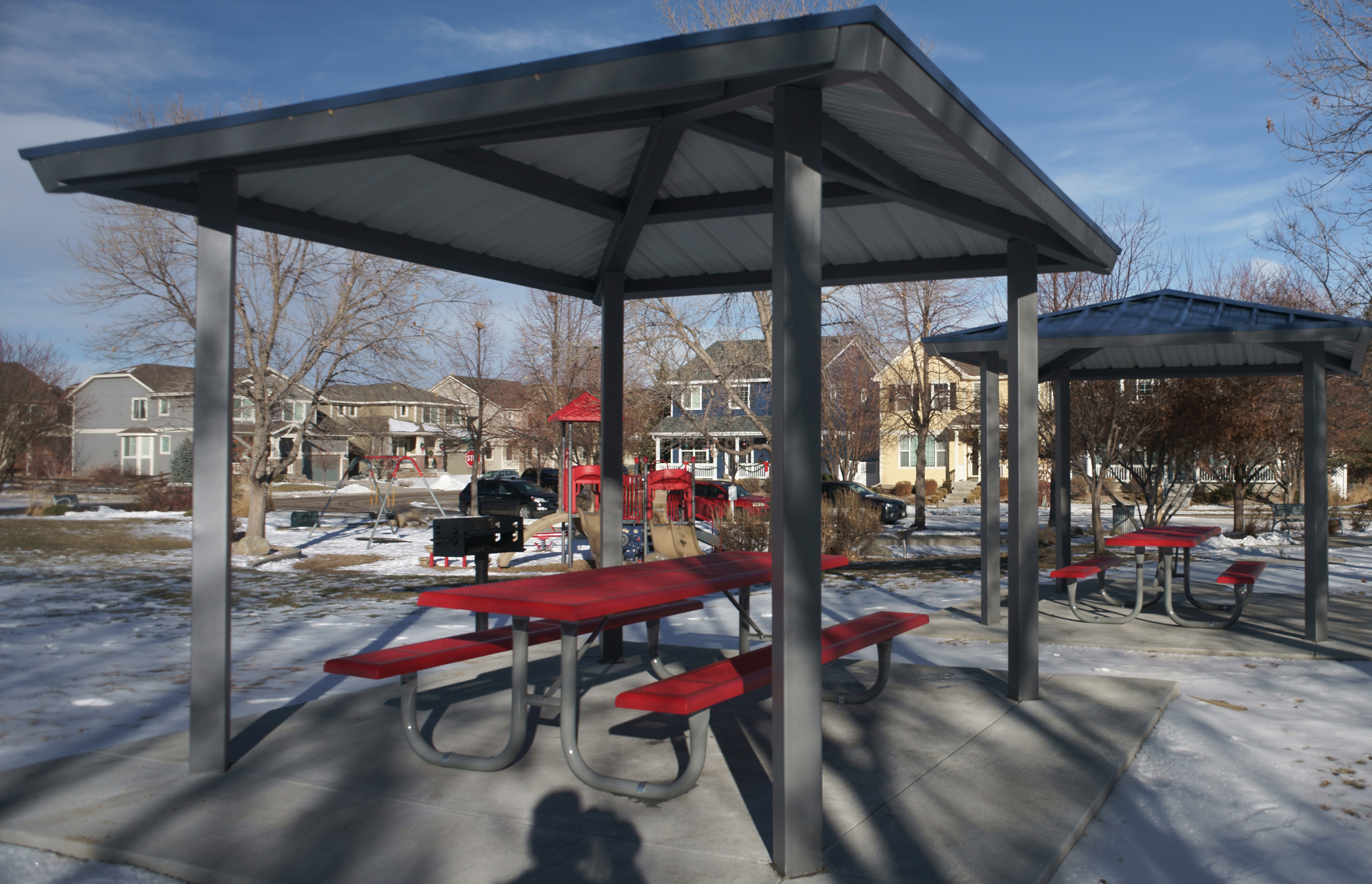 Picknic tables with awning and grill in Observatory Village Park